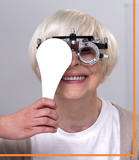 mature woman getting eyes tested